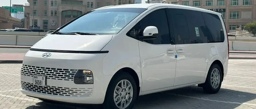 Hyundai Staria electric minivan available for rentals in Dubai, showcasing a modern design and spacious interior.