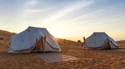 overnight-desert-safari-glamping-tents-desert-sunrise